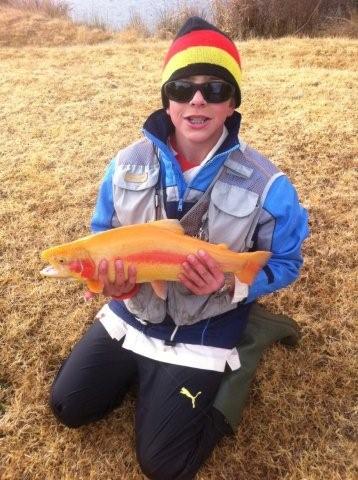 Christopher Gous - 11 years old 2Kg Golden Trout in spawning colours on Driehoek Farm